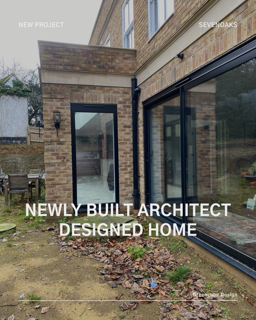 Brick house exterior with large black-framed glass doors; leaves on the ground in a yard, overlay text reads 'New Project' and 'Newly Built Architect Designed Home'.
